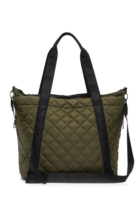 olive green quilted tote bag.